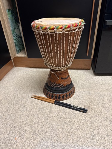 Hand carved wooden djembe - hand, drum