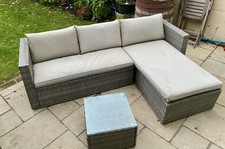Rattan Garden Corner Sofa Set with Glass Top Table. Used but fine Condition.