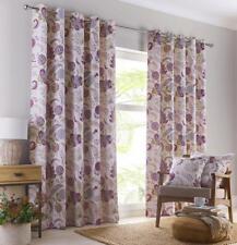 Eyelet curtains lined window