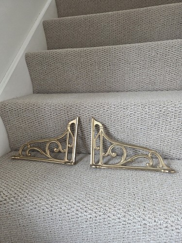 Ornate brass scrollwork - brass,