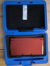 Nintendo 3DS Metallic Red Console With 5 games including Pokémon Pearl and Zelda