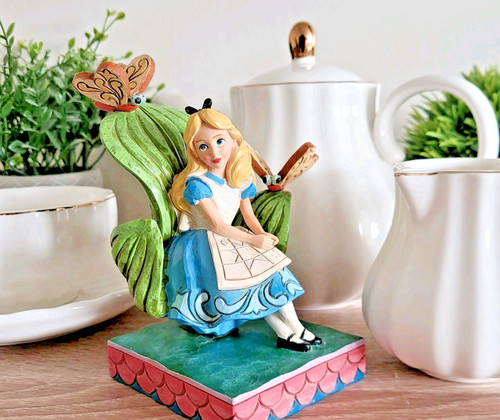 Disney traditions alice - traditions,