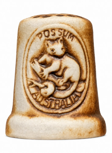 Swagman pottery possum thimble - swagman,