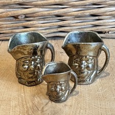 Vintage Brass-effect Toby Jugs