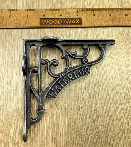 Pair shelf brackets cast - of,