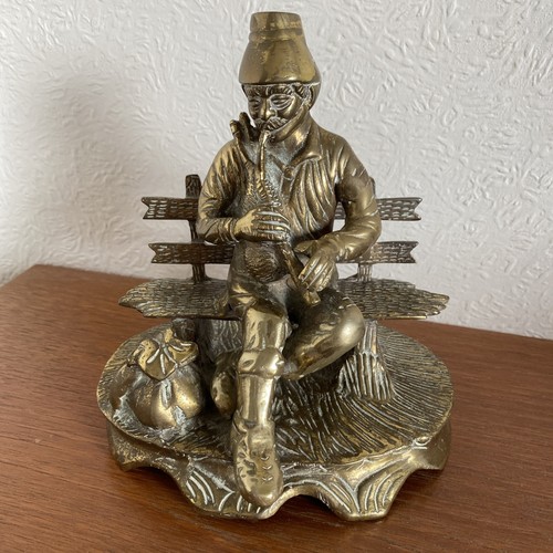 Vintage brass bagpipe player - vintage,