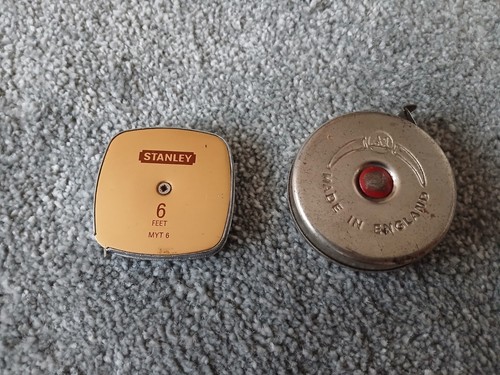 Two vintage tape measures - vintage,