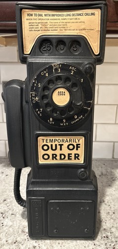 Vintage plastic pay phone - “pay,
