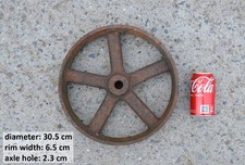 old vintage cast iron wheel -