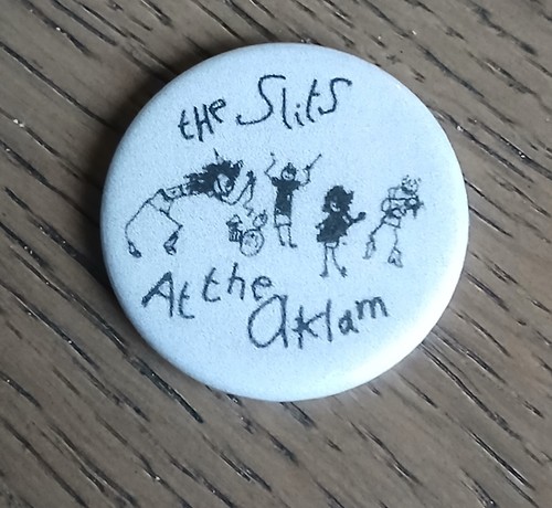 Slits the aklam button - at,