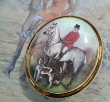 An Aynsley trinket box of foxhunting interest with   a horse and hound scene.