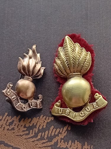 Two brass ubique flaming - brass,