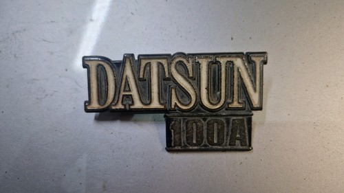 Datsun 100 badge classic car - a,