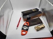 orange cigar cutter, gold