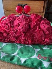 Boden pink flower clutch bag.