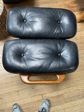 One Herman Miller Eames Lounge