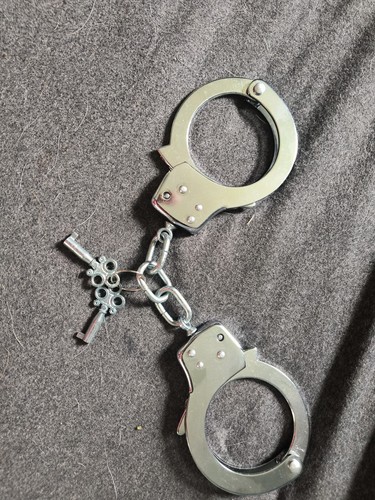Polished steel handcuffs - polished,