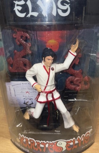 Elvis figure x - 7”,