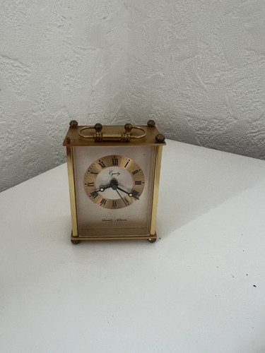 Equity quartz alarm carriage