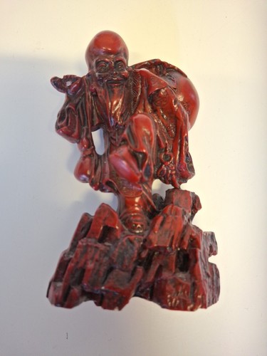 Vintage red stone laughing - vintage,