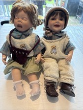 Pair of porcelain dolls - boy