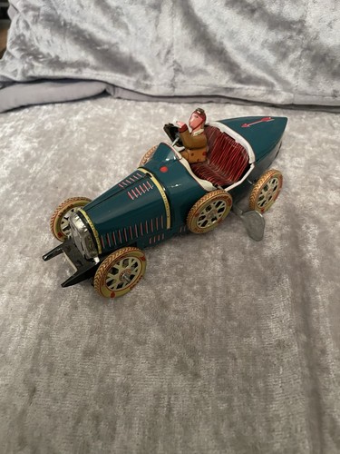 Tin plate car spring broken - car,