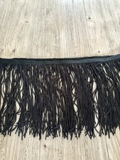 Long fringing tassel trim