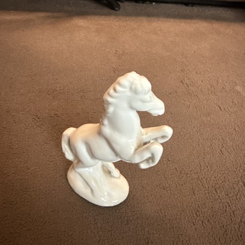 White porcelain horse ornament - white,
