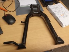 KAWASAKI KH125A  NEW GENUINE ORIGINAL MAIN STAND 34011-051