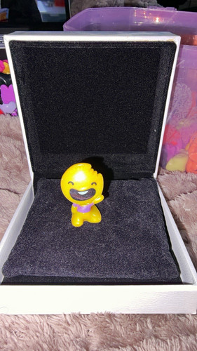 Small yellow plastic smiley - plastic,