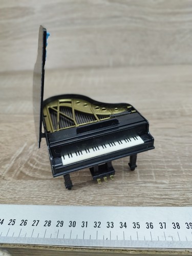 Small black grand piano - small,