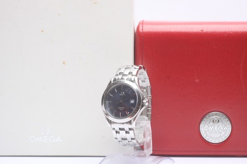Near mint box omega - w/box],