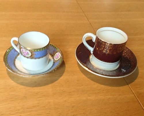 Two demitasse coffee cups and - cups,