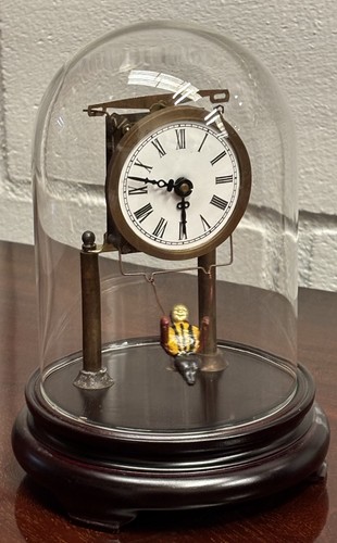 Novelty girl swing clock - on,
