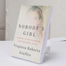Nobody's Girl: A Memoir of Surviving Abuse and Fighting for Justice Paperback