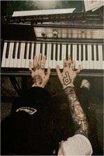 Tattooed Hands Playing Vintage
