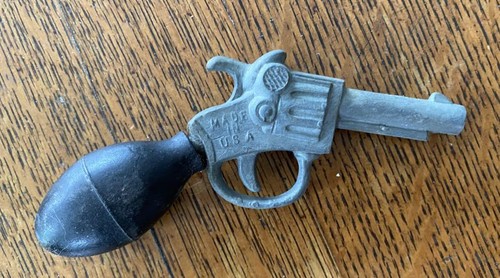 Antique squirt gun - metal, w/