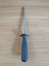  Butchers sharpening  steel