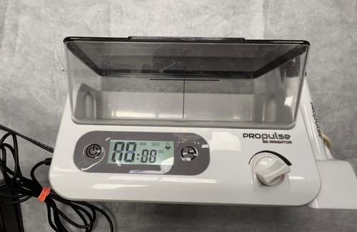 Propulse ear irrigator with - ear,