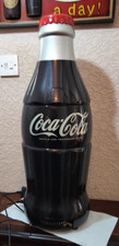 Tall coca cola bottle shaped fridge good working with carrying handle