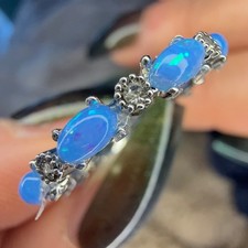 Purple Fire Opal Ring Black