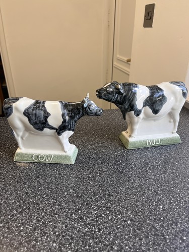 Pair vintage rye pottery - of,