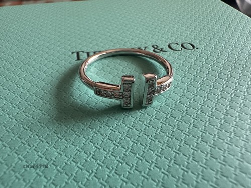 New ring 18k white - t, gold