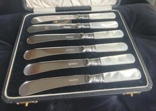 A beautiful set of 6 antique fruit/dessert knives with mother of pearl handles