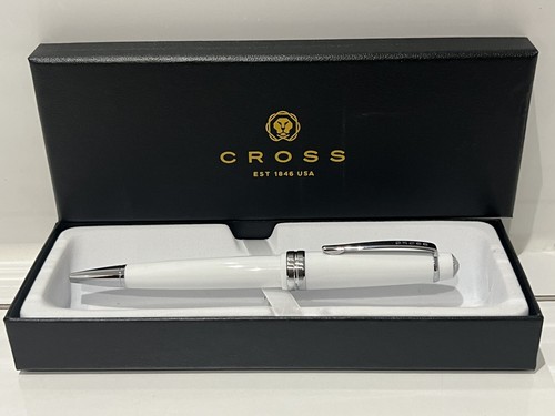 Cross polished white with - cross,
