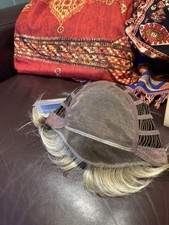 Raquel Welch wig, 'Here to