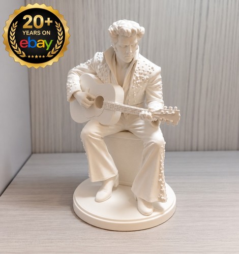 Elvis guitar statue sitting - elvis,