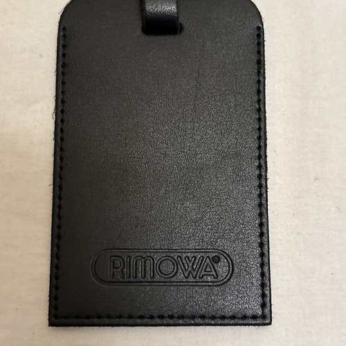 Rimowa black leather luggage - rimowa,