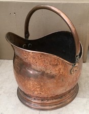 AN ANTIQUE HAND HAMMERED SOLID