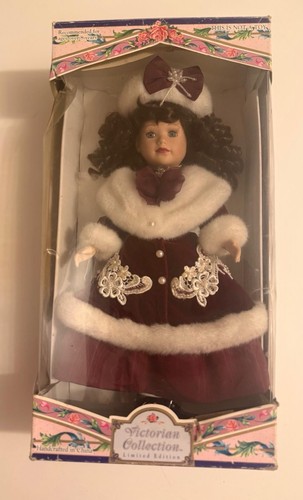 1997 brass key doll - brass,